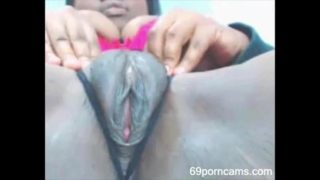 Horny Ebony Chick Rubs Her Fat Pussy & Squirts